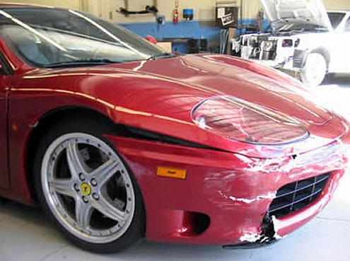 Before: red Ferrari with front-end collision damage to the bumper, fender and headlight